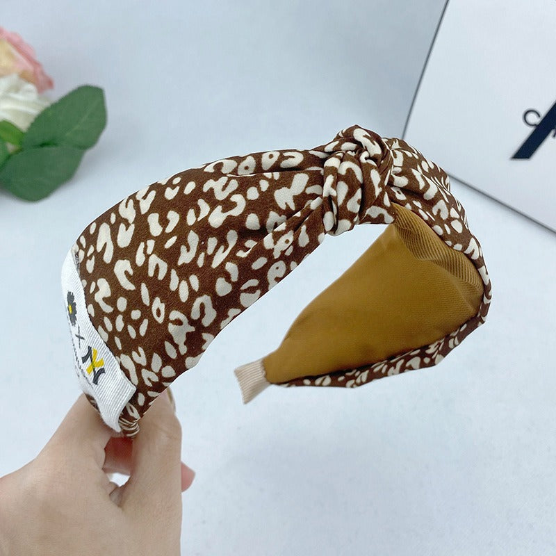 Korean Autumn And Winter Leopard Pattern Plush Hair Band With Wide Edge Knot And Simple Temperament Cross Hair Band