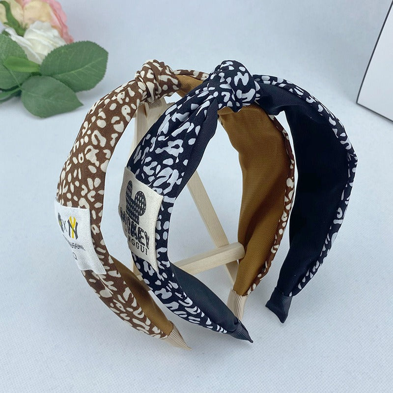 Korean Autumn And Winter Leopard Pattern Plush Hair Band With Wide Edge Knot And Simple Temperament Cross Hair Band