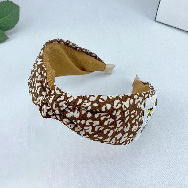 Korean Autumn And Winter Leopard Pattern Plush Hair Band With Wide Edge Knot And Simple Temperament Cross Hair Band