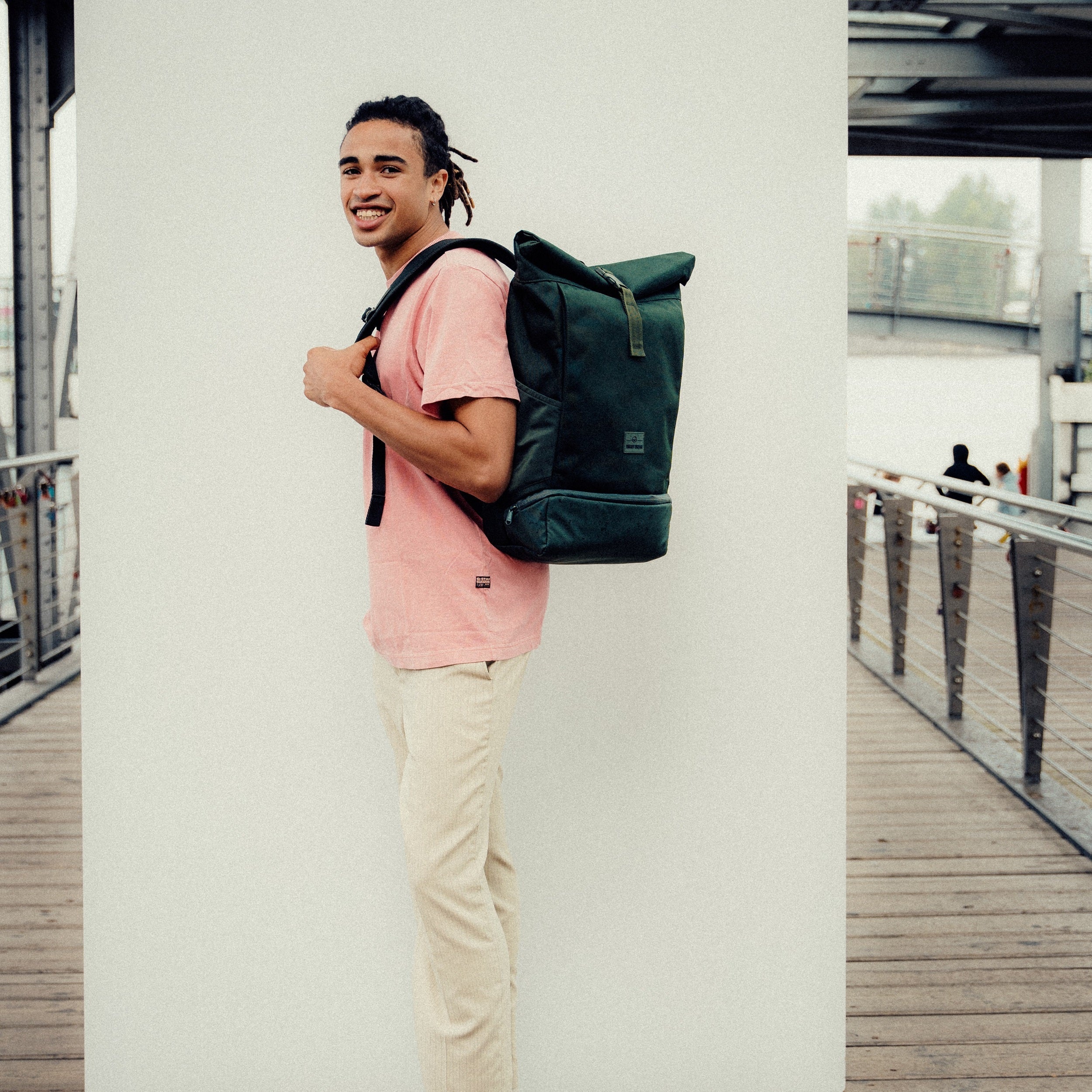 Versatile Roll Top Backpack for Work Travel with 16 Inch Laptop Fit